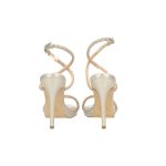 Ezüst színű, magassarkú ecobőr szandál, strasszkövekkel díszített pántokkal, valódi bőr talprésszel